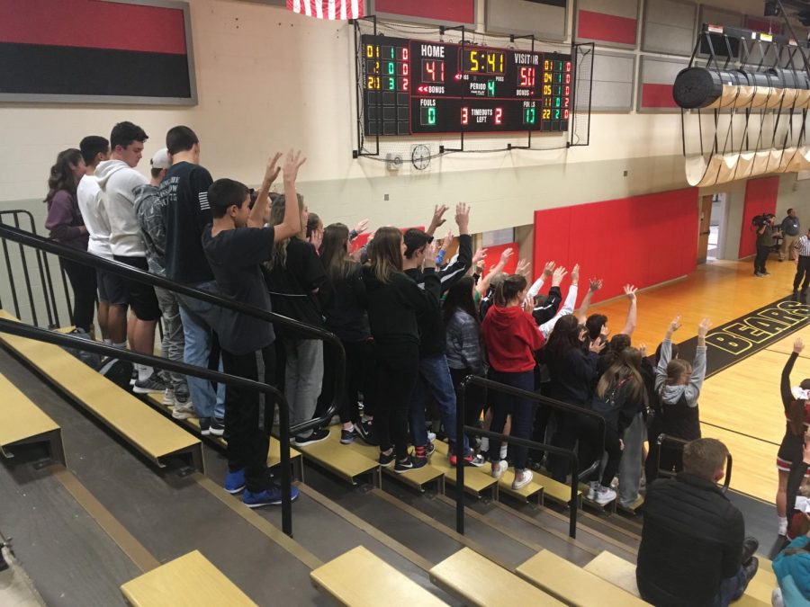 The Den gets ready for Jerry Kapp to make his foul shot