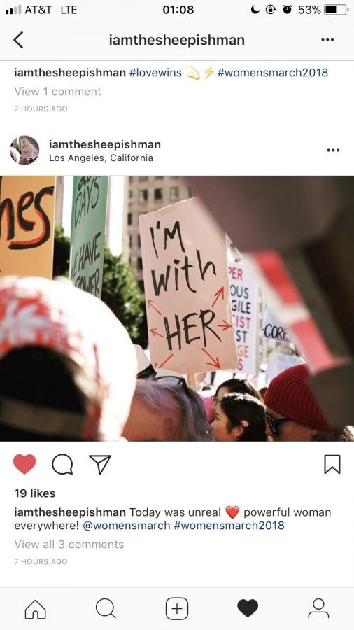 Powerful women hold their signs high as they march the streets in California