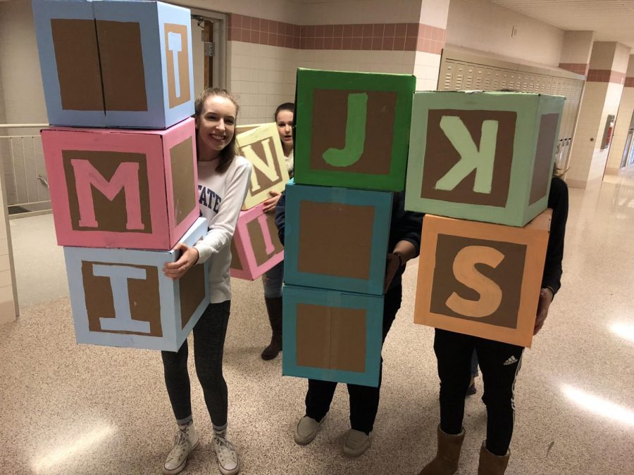 Student Council students delivers blocks to classrooms this week as part of its Mini-THON fundraiser. 