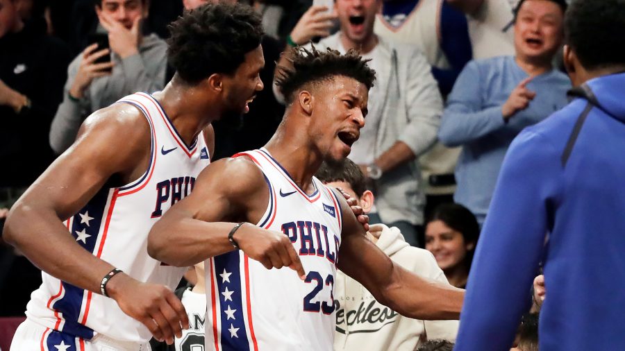 Joel+Embiid+celebrates+with+Jimmy+Butler+after+Butler+drilled+the+game-winning+shot+for+the+Sixers+on+Sunday+night.