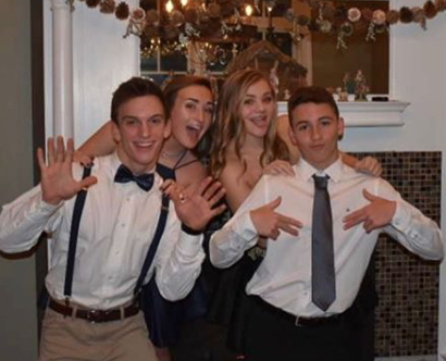 Juniors Evan Mortimer, Chrissy Quinn, Aubrey Souders, and Adriano Domingueti pose for Harvest Ball pictures.