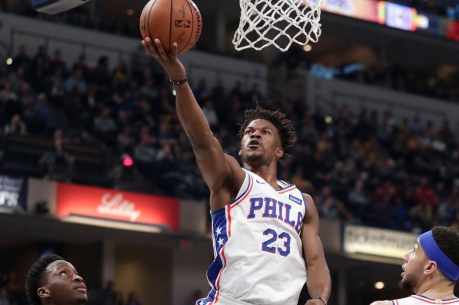 Jimmy Butler drives for a layup over Pacers Victor Oladipo in the Sixers 120-96 win.