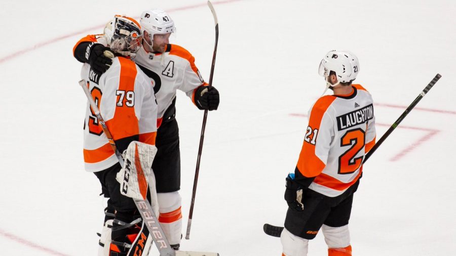 Carter+Hart%2C+Sean+Couturier%2C+and+Scott+Laughton+celebrate+back-to-back+wins+over+the+weekend+against+Detroit.