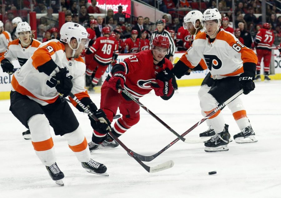 The Carolina Hurricanes defeated the Flyers 5-2 on Saturday, mathematically eliminating Philadelphia from playoff contention.