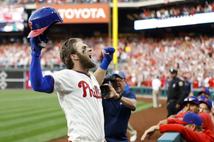 Phillies Bryce Harper embraces the curtain call after launching his 1st homer as a Phillie - a 465 foot moonshot.