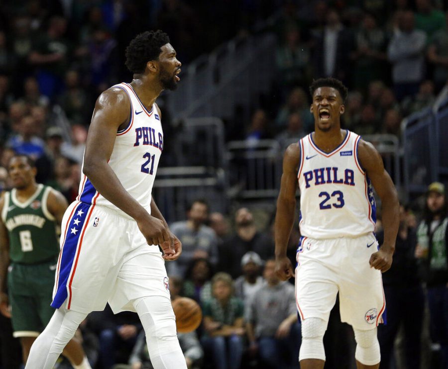 Sixers+Joel+Embiid+and+Jimmy+Butler+as+the+Sixers+clinched+a+playoff+berth%2C+beating+the+1st+place+Bucks+130-125.