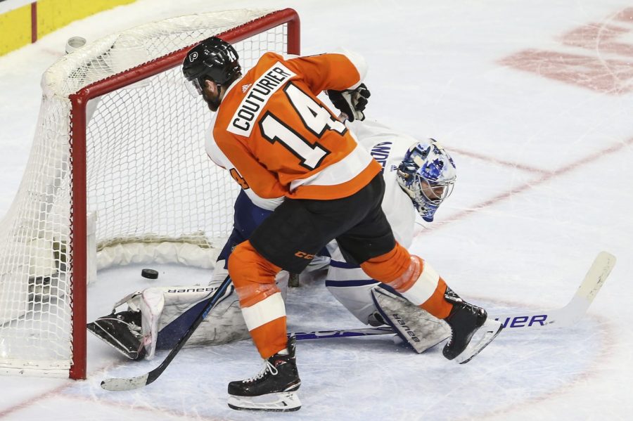 Flyers Sean Couturier fools Torontos Frederik Andersen to win the game for Philly in the shootout.