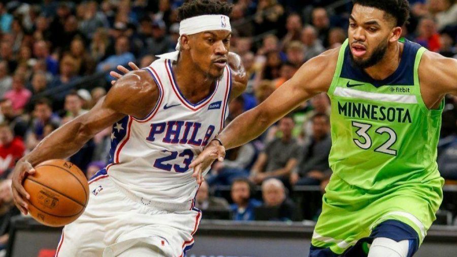 Sixers Jimmy Butler takes on Timberwolves Karl-Anthony Towns as the Sixers defeated the Wolves 118-109 on Saturday.