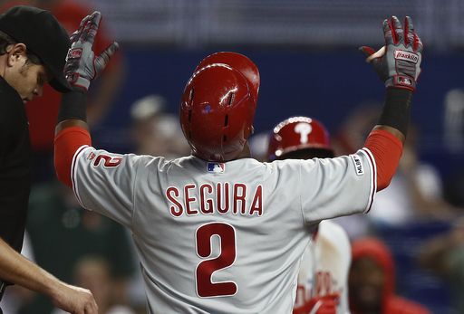 Phillies shortstop Jean Segura crosses the plate after hitting a game-winning, 2-run home run to defeat the Miami Marlins on Sunday afternoon.