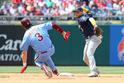 Phillies Bryce Harper is forced out as the Brewers turn a double play. The Brewers defeated the Phillies 11-3 on Thursday afternoon.