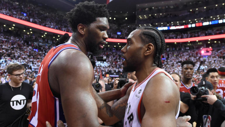 Sixers Joel Embiid and Raptors Kawhi Leonard congratulate each other after the Raptors eliminated the Sixers on Sunday night.