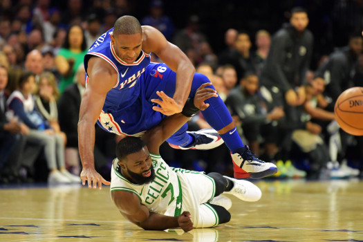 PHILADELPHIA, PA - OCTOBER 23: Al Horford #42 of the Philadelphia 76ers falls over Jaylen Brown #7 of the Boston Celtics at Wells Fargo Center on October 23, 2019 in Philadelphia, Pennsylvania. NOTE TO USER: User expressly acknowledges and agrees that, by downloading and or using this photograph, User is consenting to the terms and conditions of the Getty Images License Agreement.  (Photo by Drew Hallowell/Getty Images)