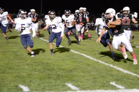 Jamie Moccia running with the ball; Springford and Boyertown have a long-held rivalry.