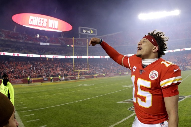 Chiefs QB Patrick Mahomes celebrates the Chiefs 51-31 comeback win to move on to the AFC Championship.