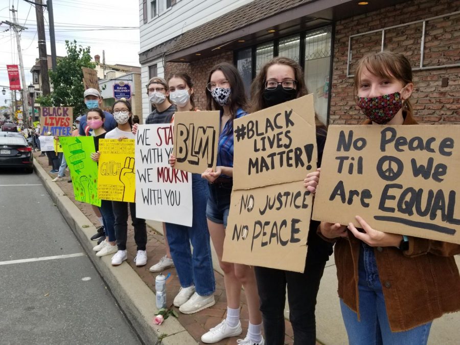 Many Boyertown students, both past and present, came out to support the Black Lives Matter movement in the silent and peaceful protest that took place on Main Street. (From left to right: Chris Angus, Hannah Desko, Samara Rayco, Eric -, Sally Fetterman, Sarah Tuk, Grace Young, Morgan Janiuk.)