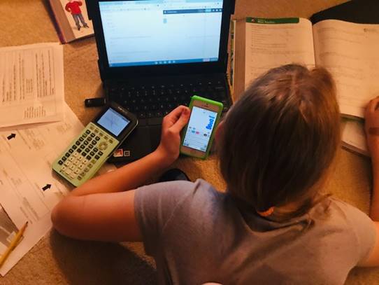 A student using their resources to cheat on a test.