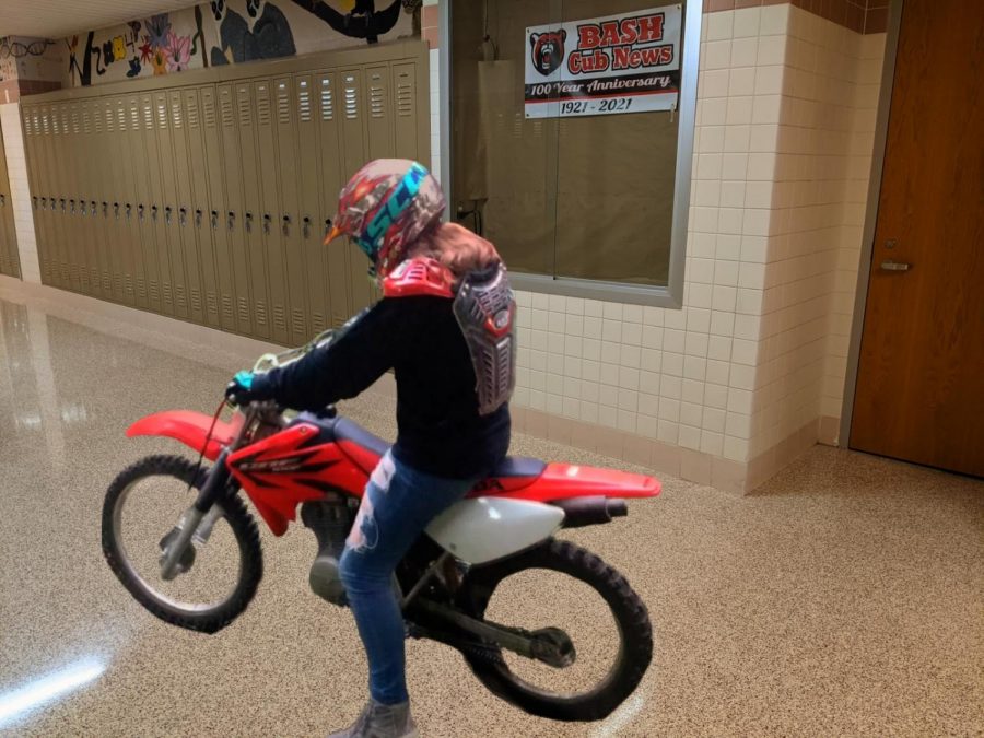 Grace Erb, 11th grader and experienced dirt-biking competitor revs up for the race! /Photo provided by Grace Erb