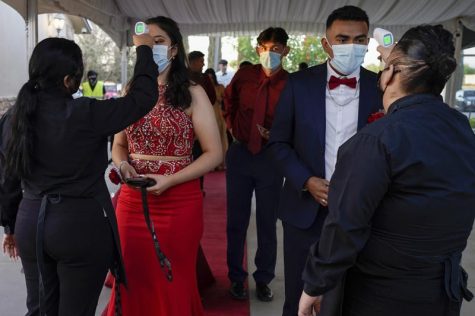 This photo shows another school practicing a safe and socially distanced prom, similar to how Boyertown;s will be.