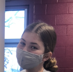 BASH student Autumn Nuss masking up for the school year