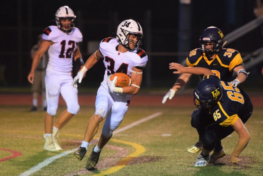 #34 Roman Marinello had a great night with 58 rushing yards and 3 total touchdowns in Boyertown's  victory over Methacton.