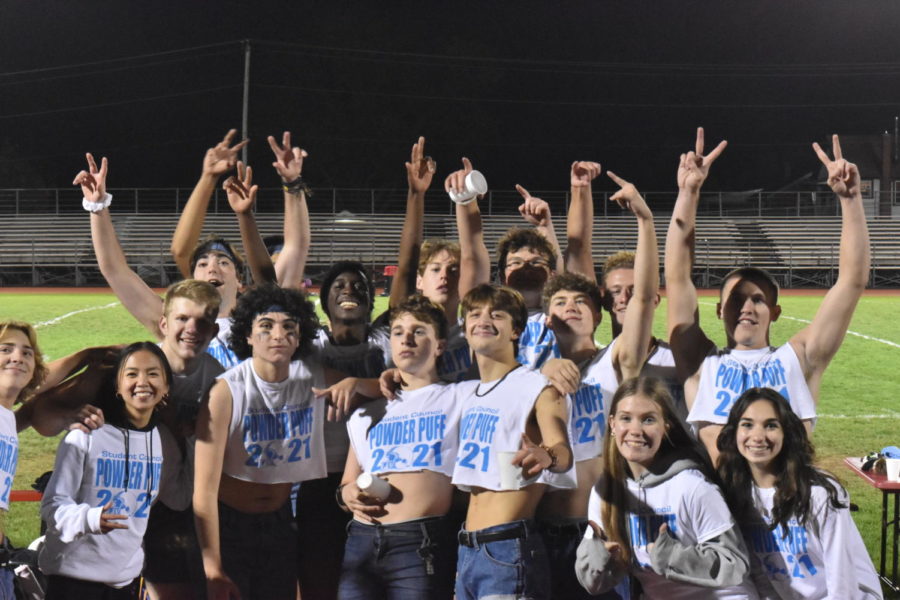 The cheerleaders and their coaches. 