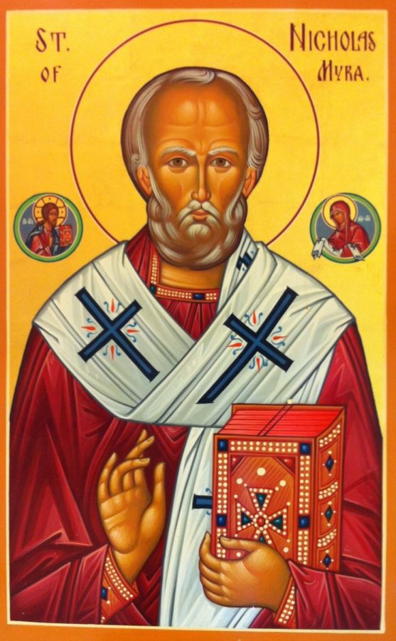 A painting of St.Nicholas, wearing a red robe holding a book 