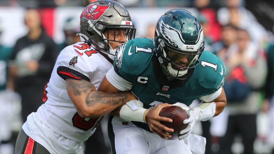 Buccaneers' safety, Antoine Winfield Jr sacks Eagles' quarterback Jalen Hurts in Tampa Bay's 31-15 victory over Philadelphia on Wild Card Weekend of the NFL playoffs.