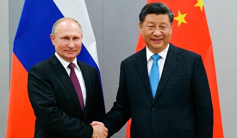Russian+president+Vladimir+Putin+and+Chinese+president+Xi+Jinping+during+a+meeting+earlier+this+year.