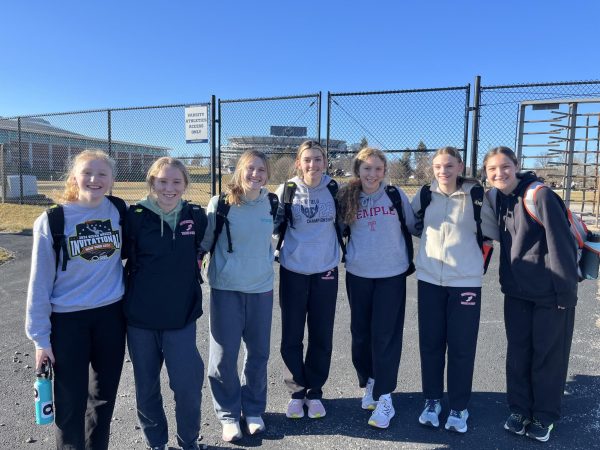 Names (left to right): Eva Montanye, Taylor Rosen, Marissa Hillegas, Katie Macoluso, Harper Glennon, Elizabeth Biehl, and Amelia Maylath.
In front of Penn State’s outdoor track after the pre-meet workout.