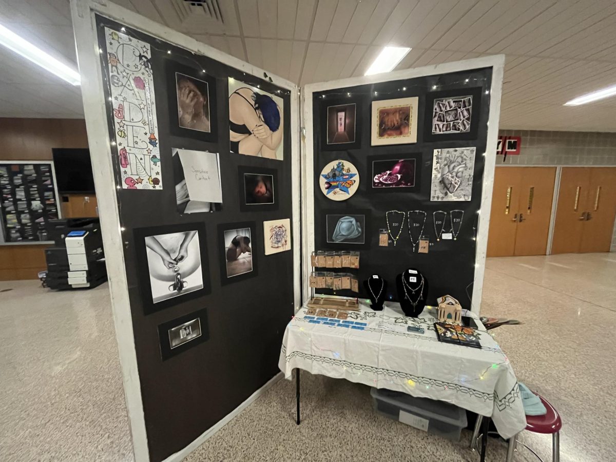The hallway was filled with showcases by seniors, featuring many of their different works.
