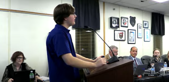 John Loos presents to the School Board