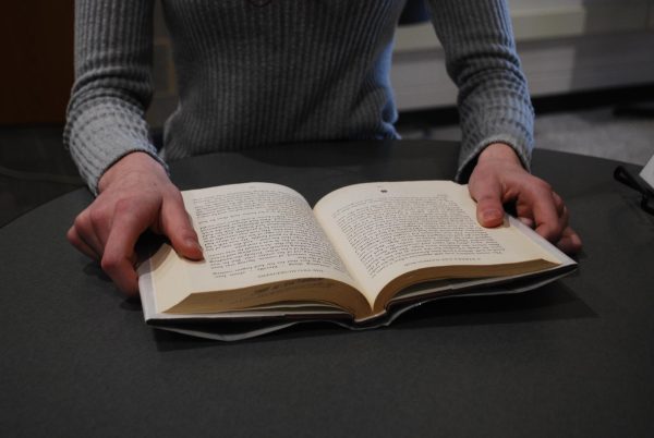 Leah Klossin enjoys a book in the BASH Library