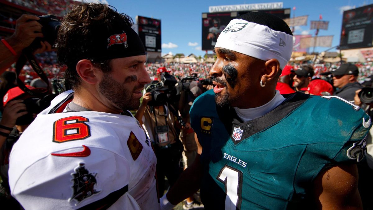 Baker Mayfield (Left) and Jalen Hurts (right) seeing each other after the game.