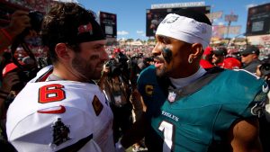 Baker Mayfield (Left) and Jalen Hurts (right) seeing each other after the game.