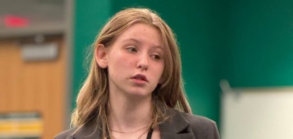 Hailey Gress speaking in WJMC meeting