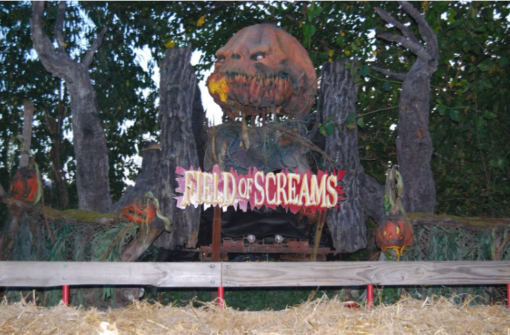 Field of Scrams logo in front of the Haunted Hayride